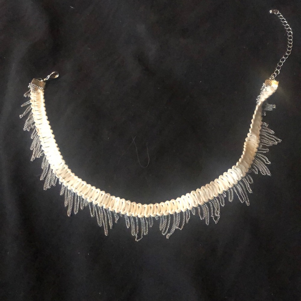 White choker necklace with stylish silver trim